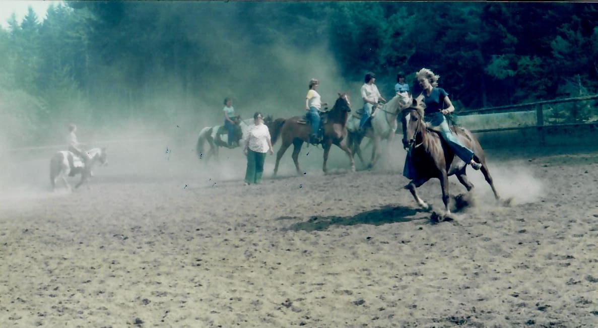 Silver Spurs 4-H horse group practicing in a dusty arena in Snowden, Washington