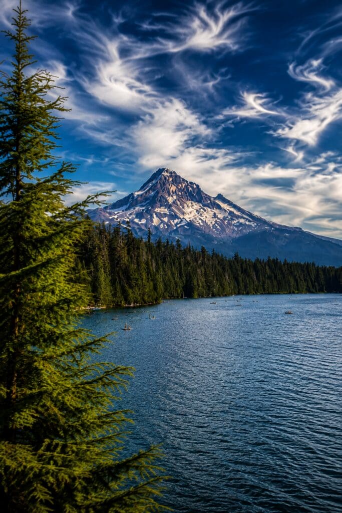 Mount Hood rising above Lost Lake and evergreen forest near Hood River, Oregon.