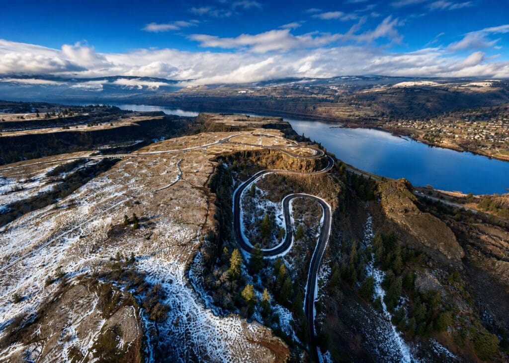 Aerial drone photograph of Rowena Crest and the historic horseshoe curve overlooking the Columbia River Gorge near Mosier, Oregon, photographed by Tobi Rose Photography.